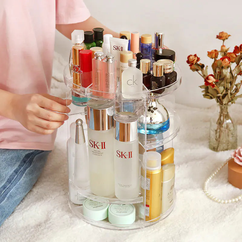 Acrylic organizer holding makeup and brushes